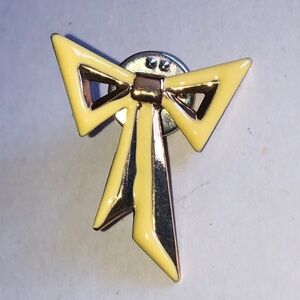 Yellow and Gold Tone Vintage Bow Pin